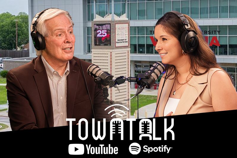 Ashley interviewing associate chancellor Dr. Nelson