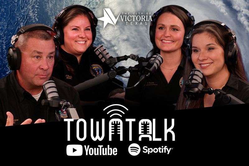 Rick McBrayer, Jena Banda, Lauren Meaux and Ashley Strevel with hurricane background