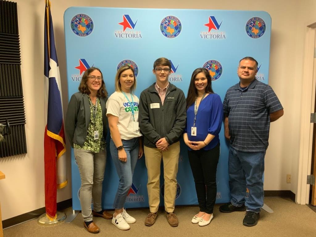 Communications & Public Affairs staff with VISD student John Andruss