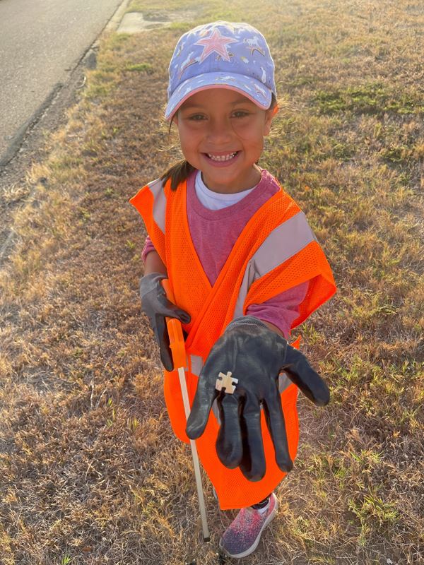 A child holding a puzzle piece