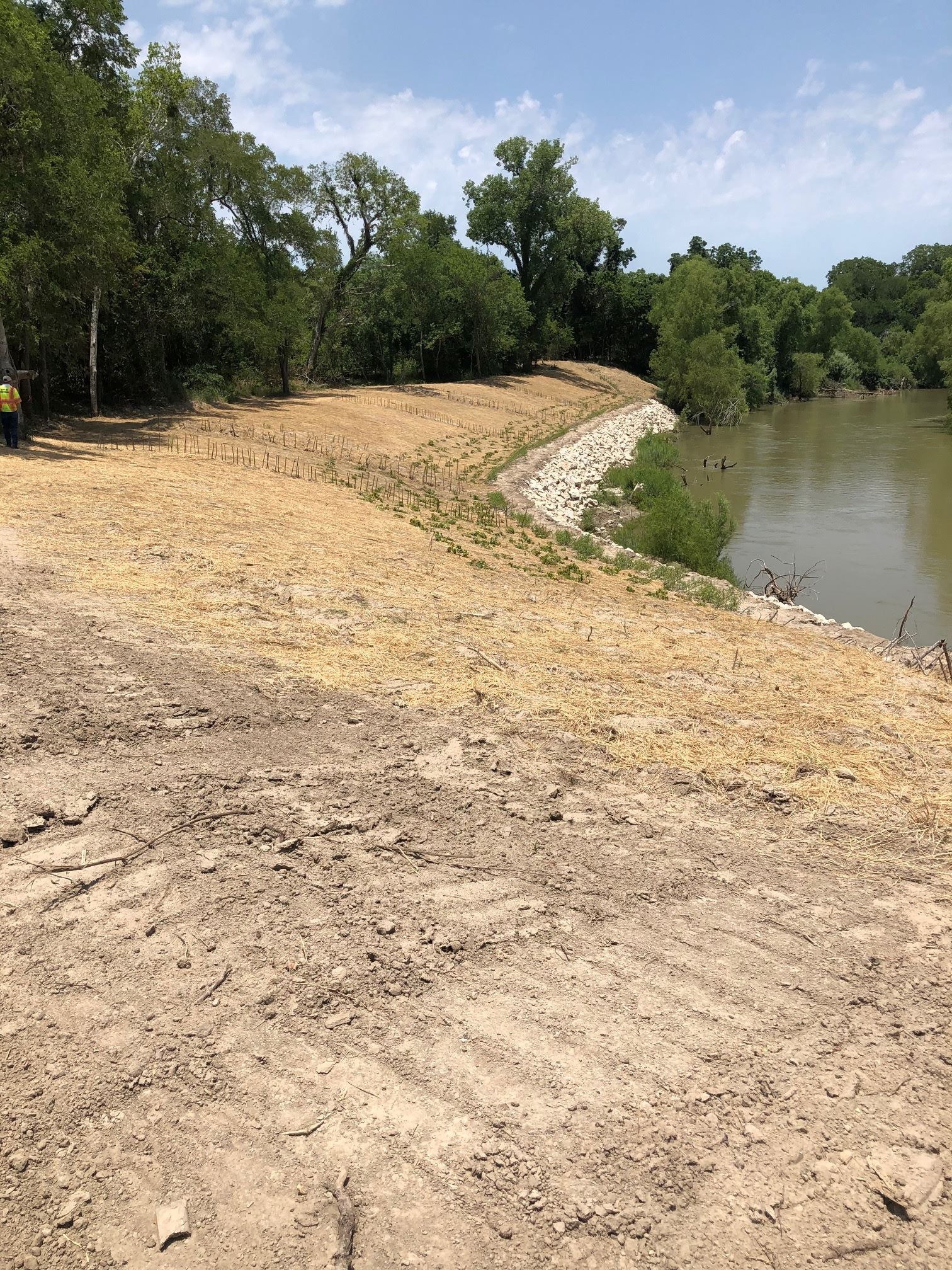 Guadalupe River bank shored up using stones