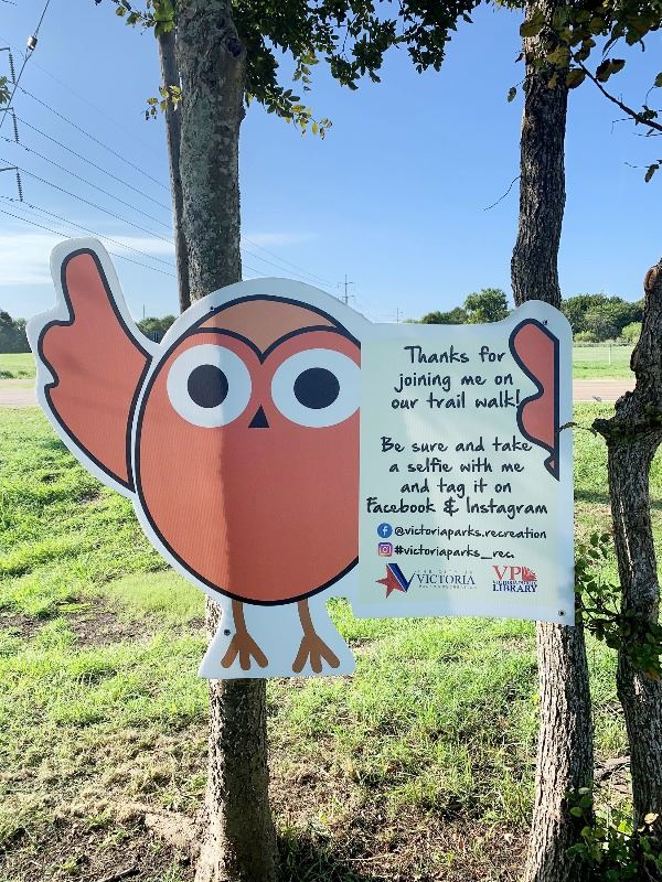 A cutout with an owl character. Text reads 